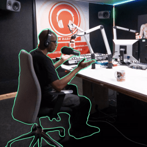 Independent podcaster in private sound studio at Mainyard Studios, London