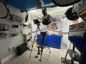 Modern, well-equipped video podcast studio in Mainyard Studios, London, featuring advanced recording equipment, soundproofing, and stylish interior designed for professional podcasters.