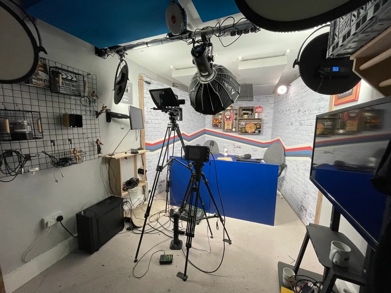 Modern, well-equipped video podcast studio in Mainyard Studios, London, featuring advanced recording equipment, soundproofing, and stylish interior designed for professional podcasters.