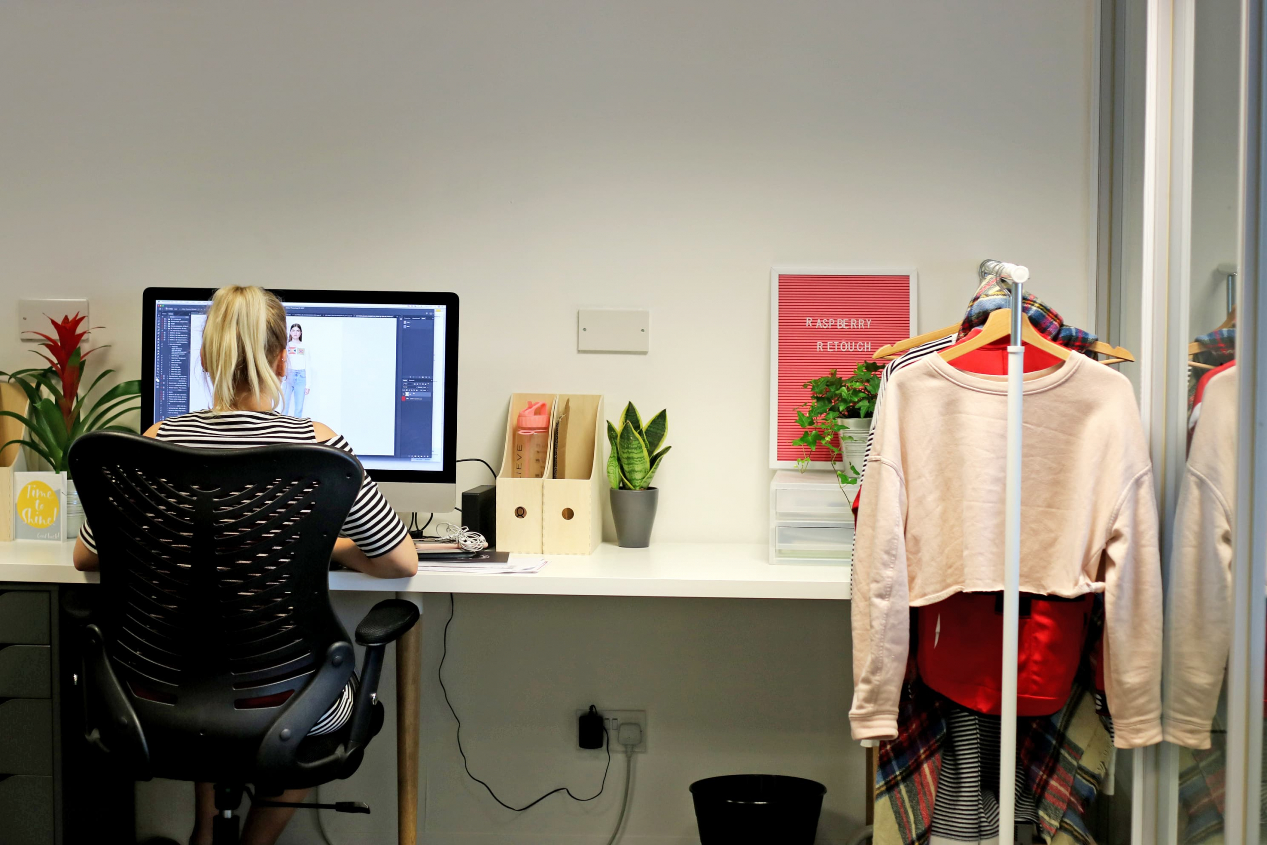 A person immersed in their work in a private, dedicated creative space