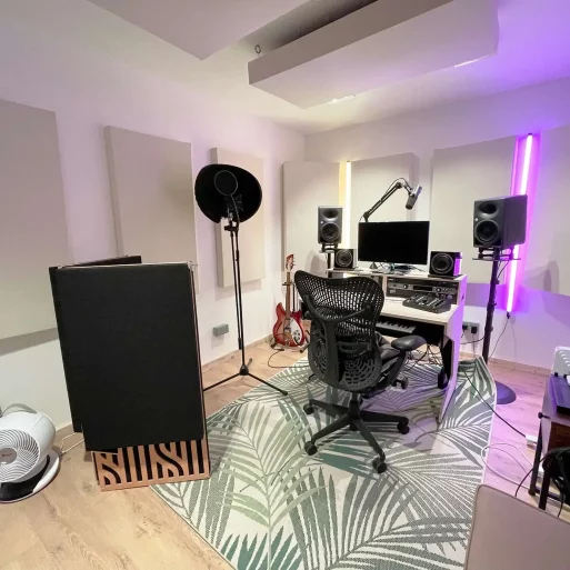 Bright and spacious soundproof music studio in Mainyard Studios, London, featuring acoustic panels and modern equipment.