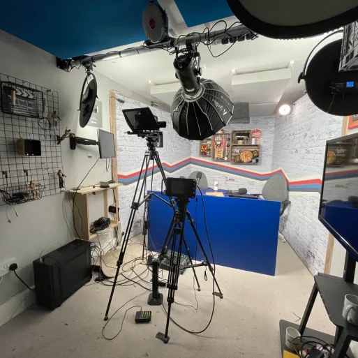 Modern, well-equipped video podcast studio in Mainyard Studios, London, featuring advanced recording equipment, soundproofing, and stylish interior designed for professional podcasters.